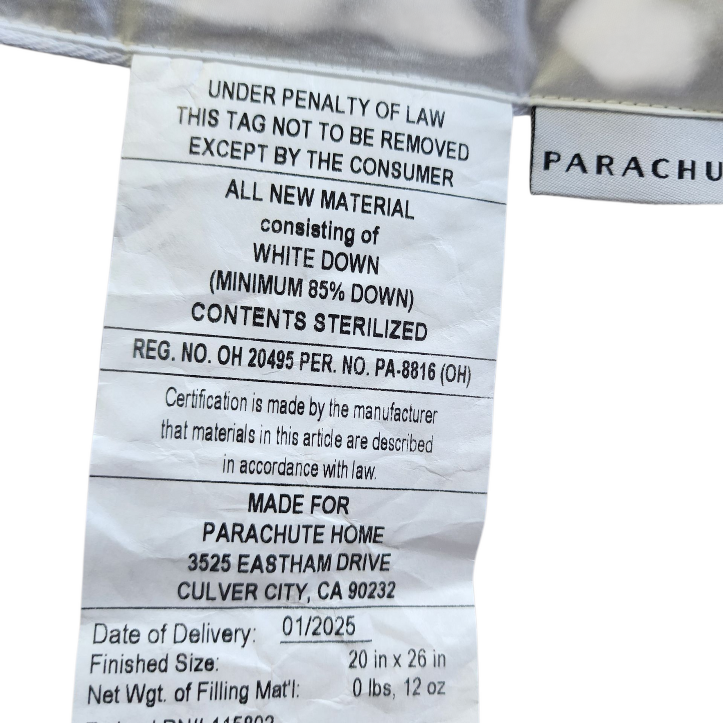 Label on a羽绒制品 with text and branding details.