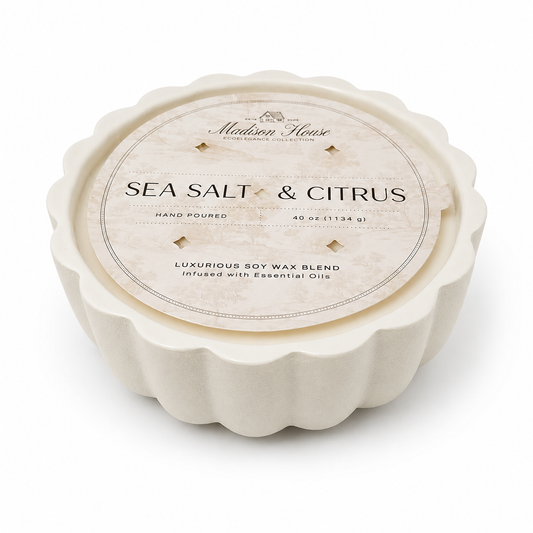 Sea Salt & Citrus candle with Madison House branding on a white background