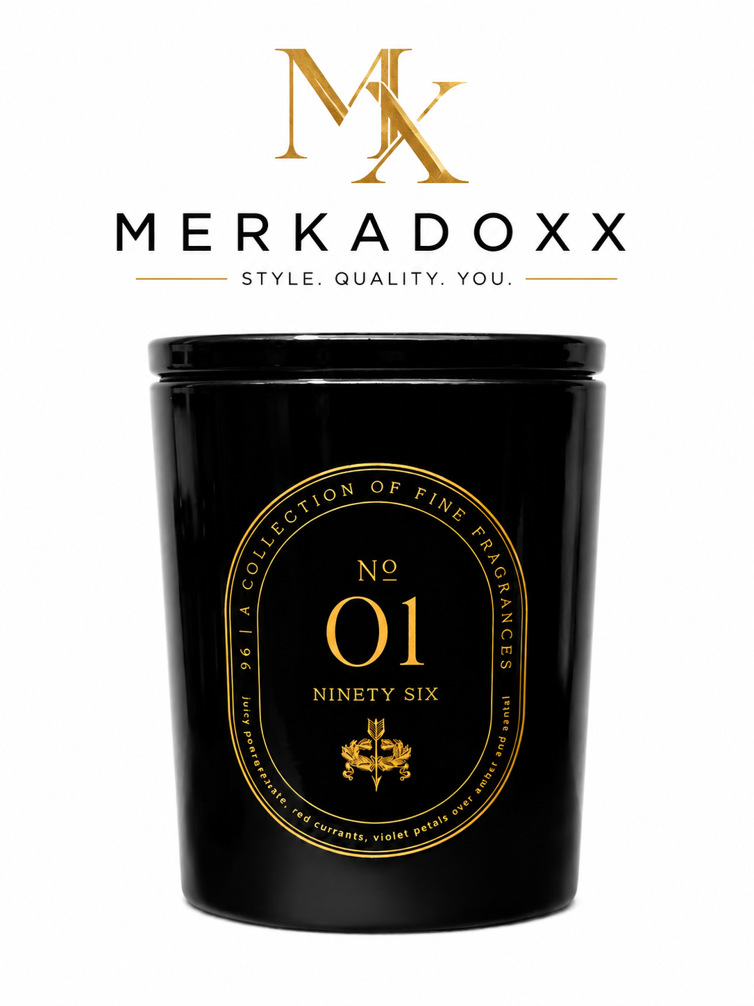 Black candle with gold label featuring Merkadoxx branding on a white background