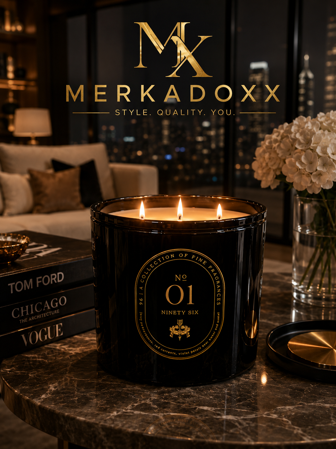 Black candle with gold accents on a marble surface, featuring the Merkadoxx brand.