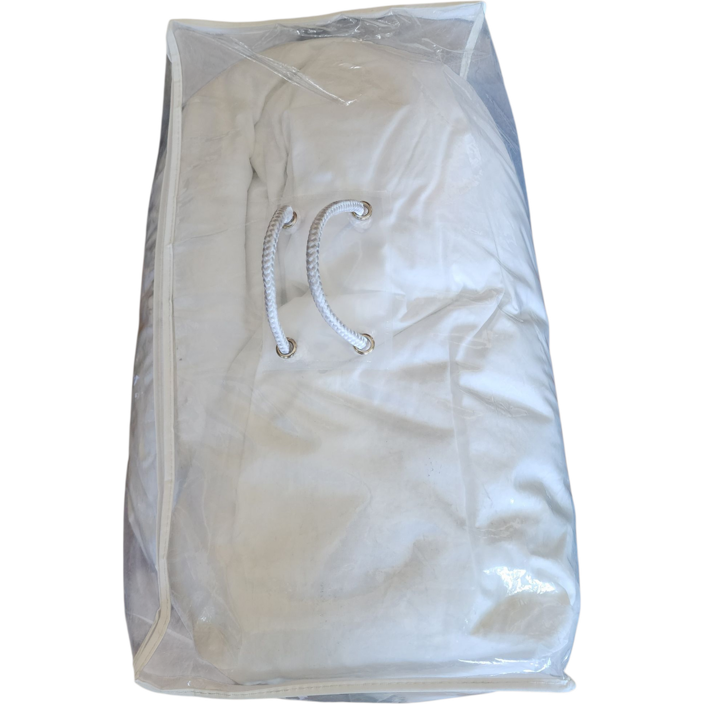 White garment in a clear plastic bag with a white background