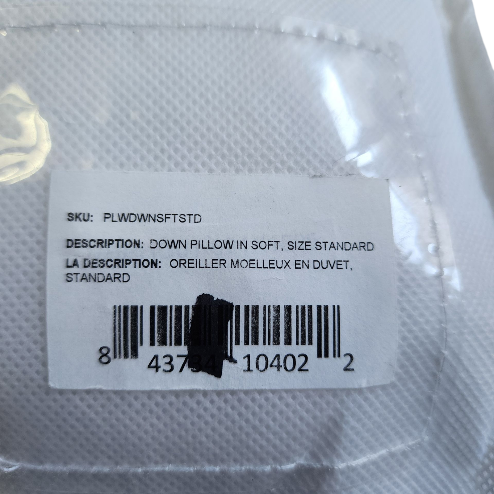 Label on a down pillow packaging with product details and barcode.