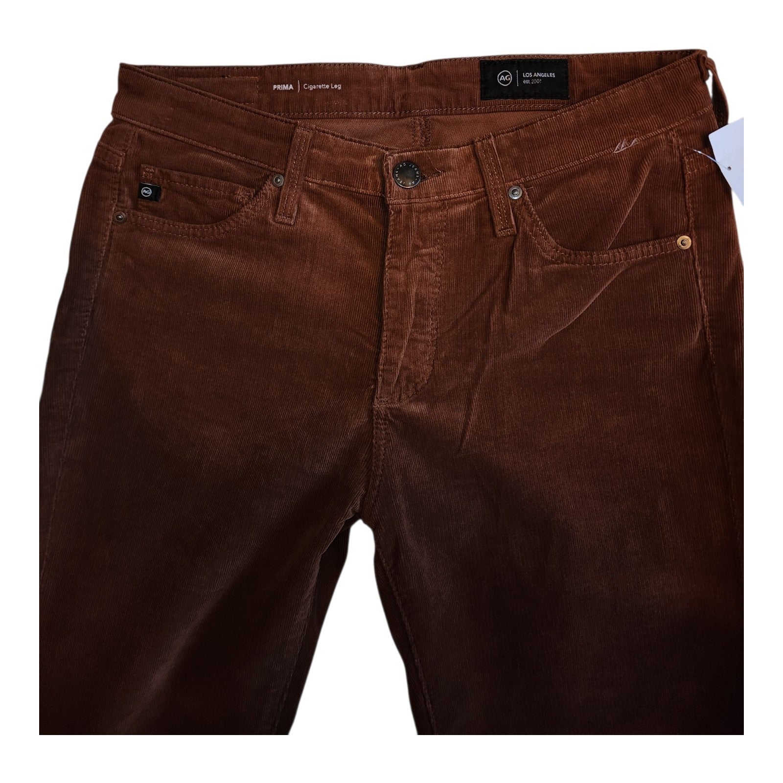 Brown pants with a tag on a white background