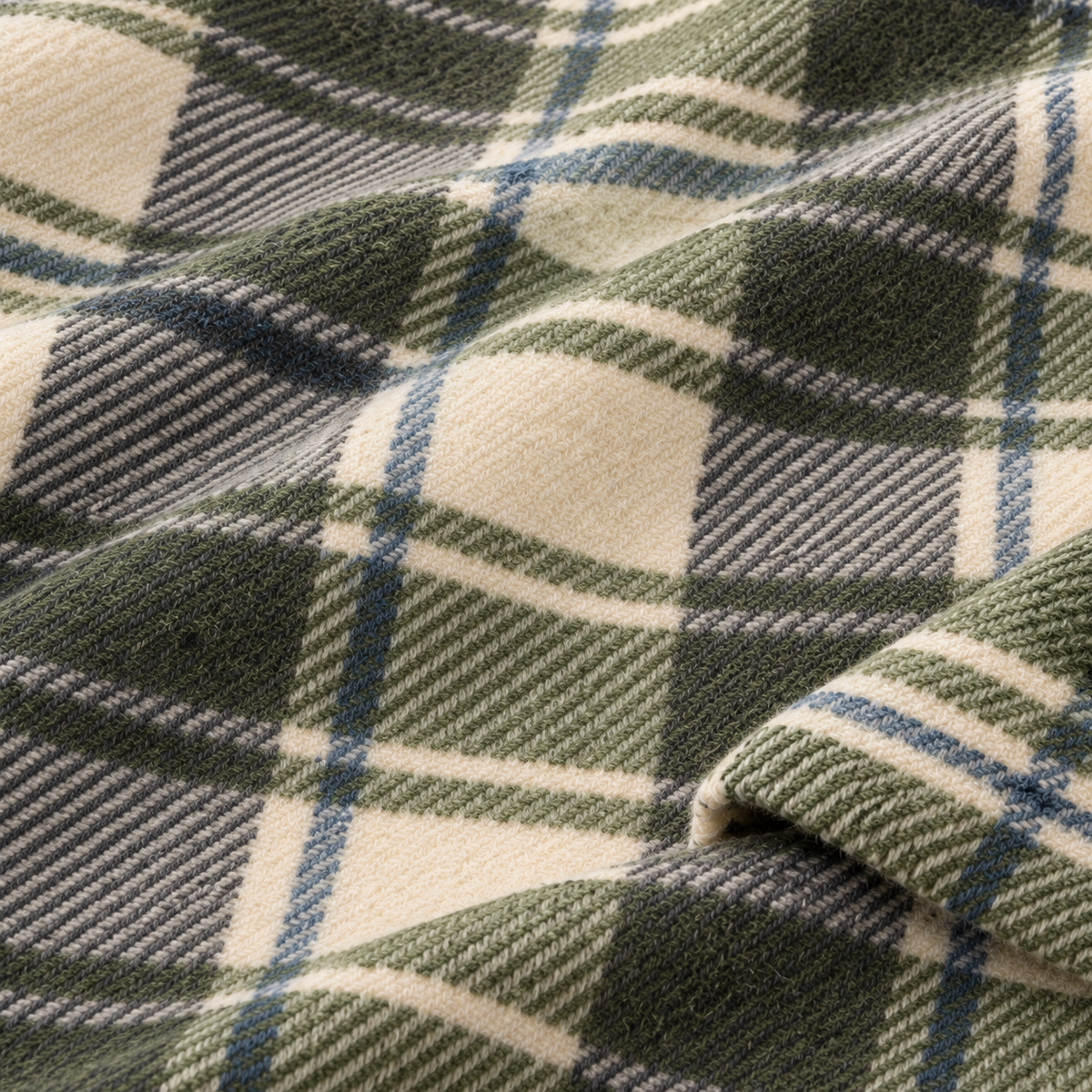 Olive plaid wool blend fabric detail